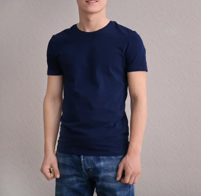A Guy Wearing Navy T Shirt With Jeans
