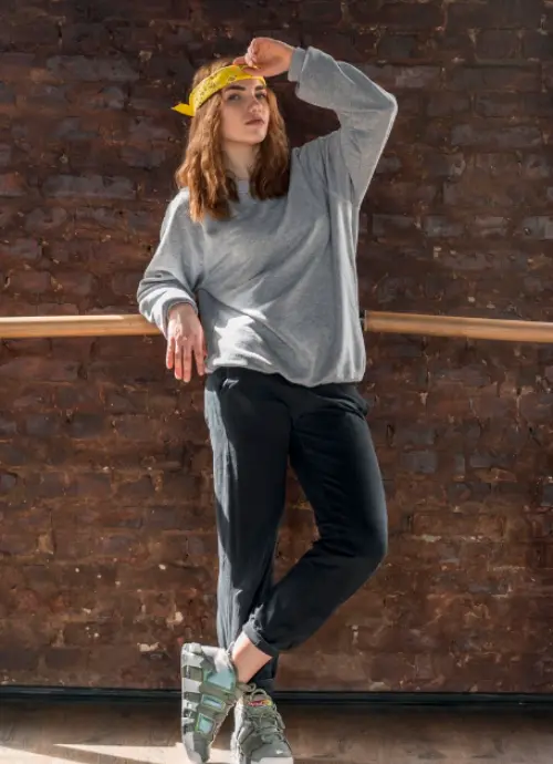 A Young Girls Wearing Oversized Graphic Tee With Trouser And Joggers
