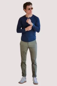 A Young Man Wearing Navy Blue Shirt With Olive Green Chino